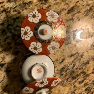 Small Japanese tea cups with lids
